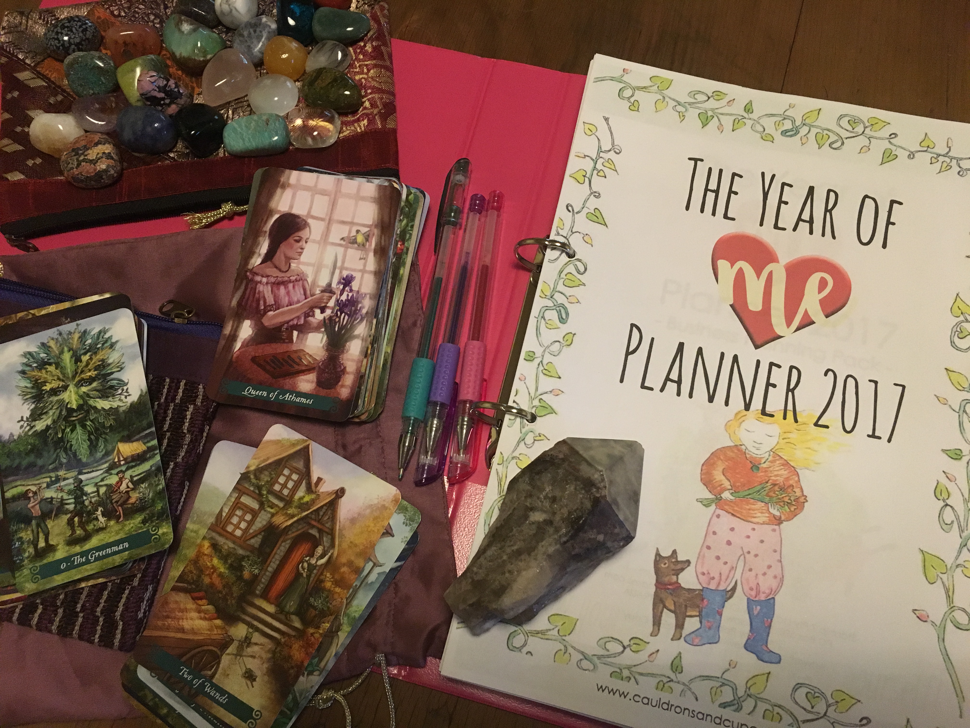 Here's my own 2017 Planner, and my 2017 gratitude stone, my 2017 crystal pack, and the oracle cards I'm going to use for the year ahead. Pretty delicious, huh?