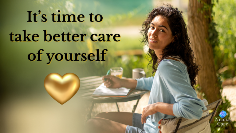 A woman sits at an outdoor table surrounded by greenery, drinking a healthy beverage while journaling — symbolizing self-care, wellbeing, and mindful reflection.