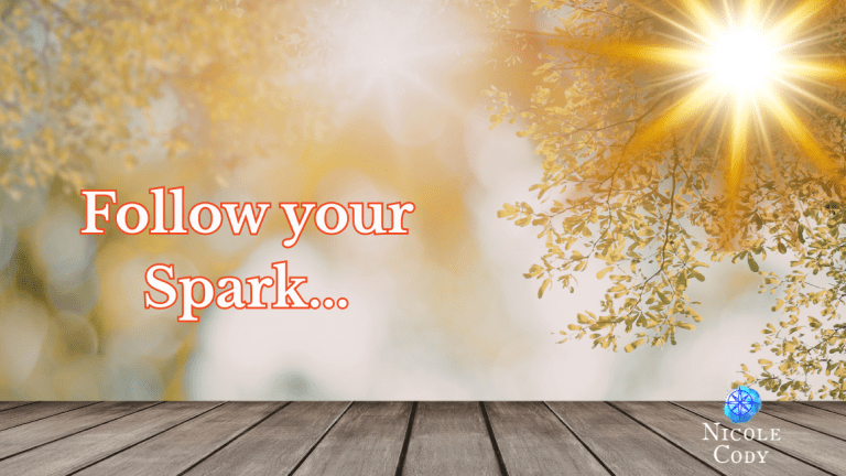 Golden sunlight through tree leaves with text “Follow your spark” symbolising inspiration and new beginnings.